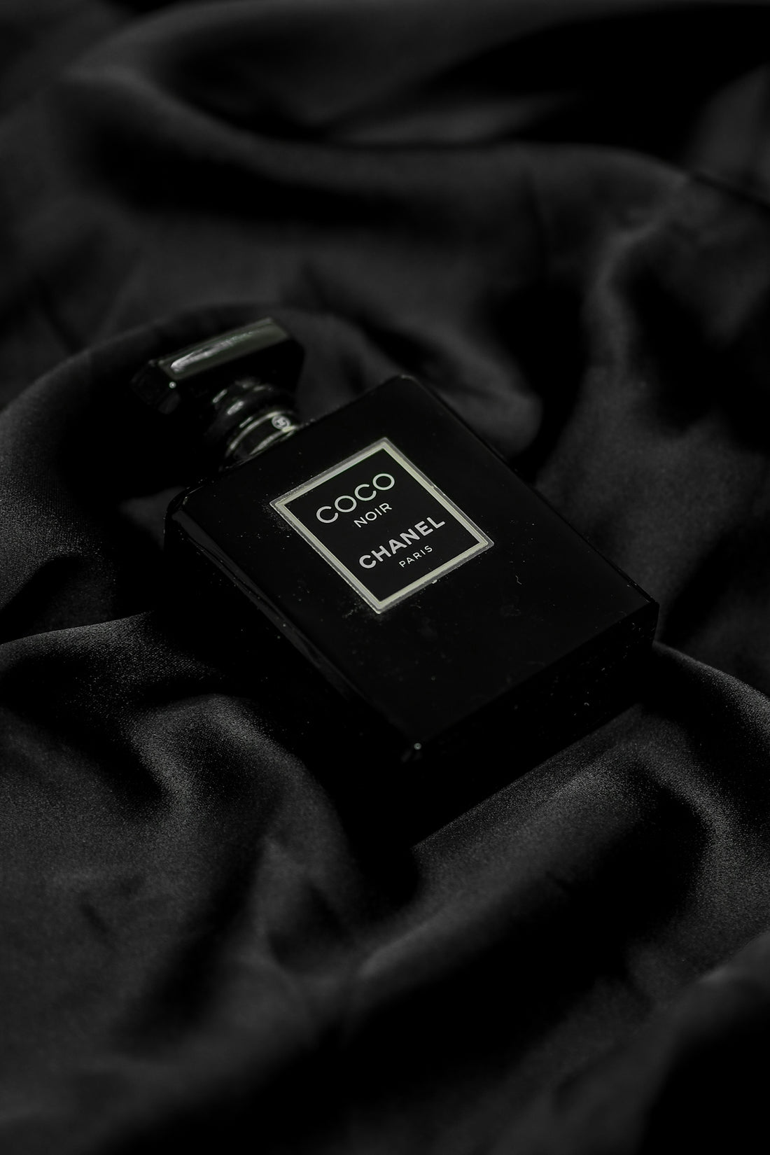 black and gold perfume bottle