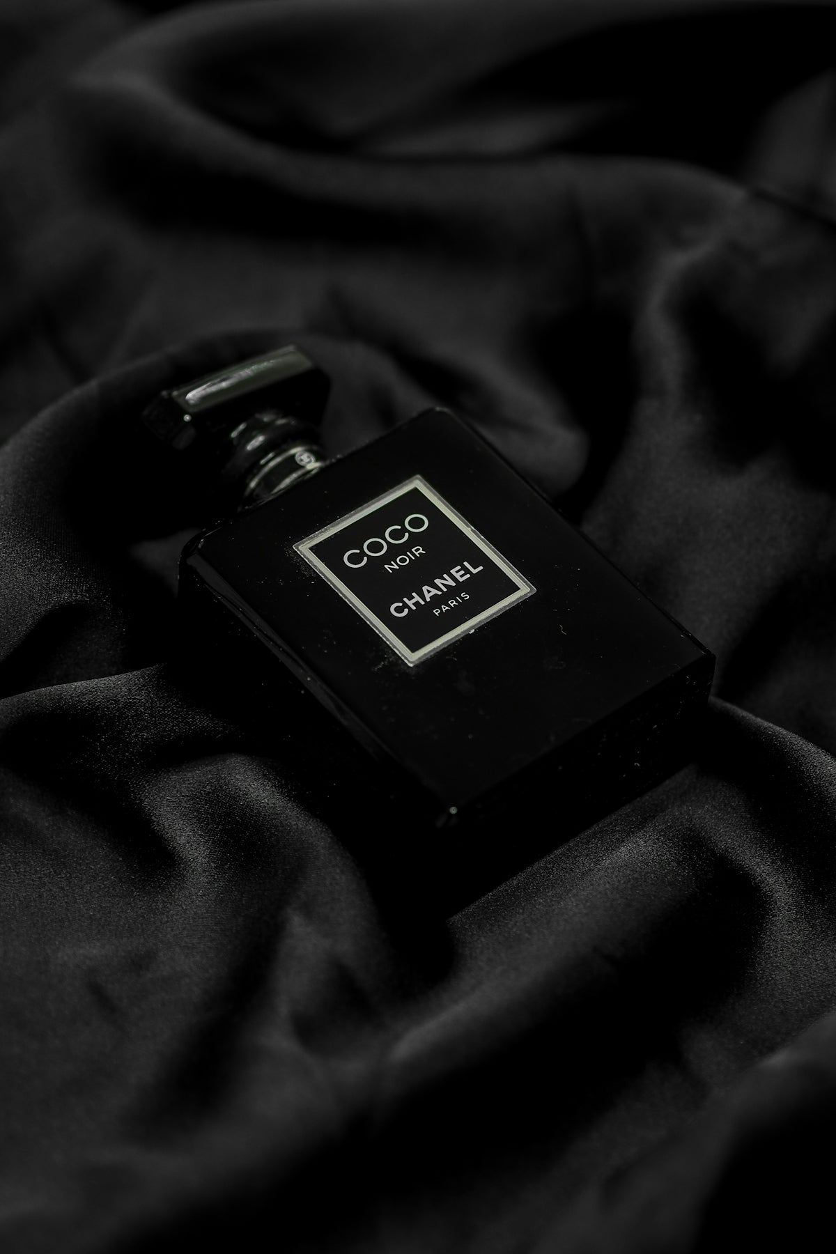 black and gold perfume bottle