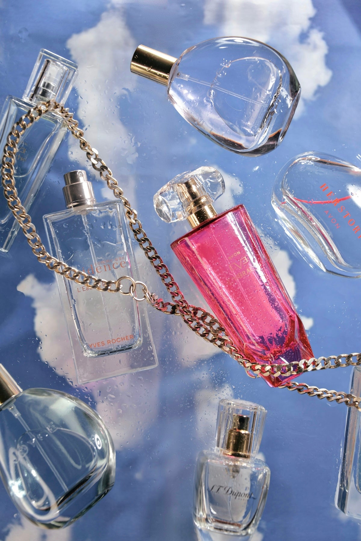 a bunch of perfume bottles on a table