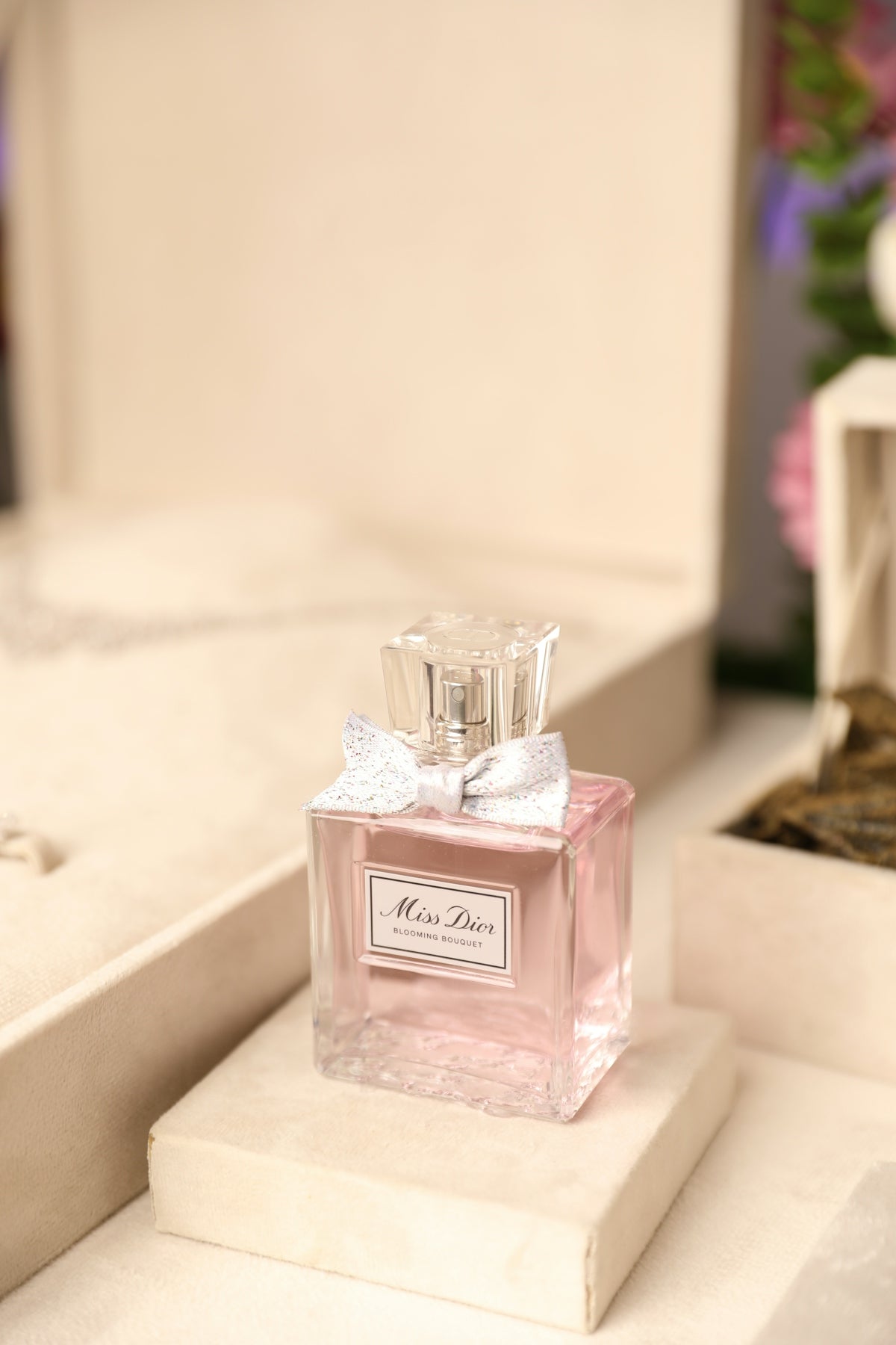 a bottle of perfume sitting on top of a counter
